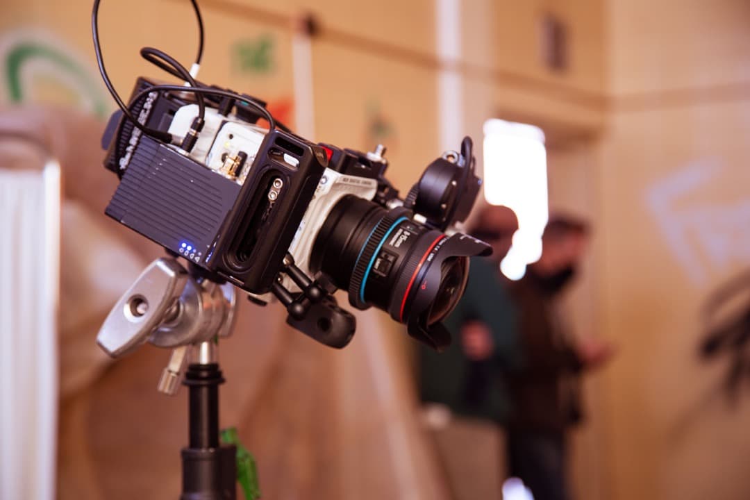 Behind the scenes photo 57 from Clone Cops production showing red komodo 6k build used for security camera footage in clone cops